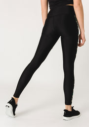 pure by luce sustainable black Rene Joburg leggings with printed side stripes inspired by South Africa