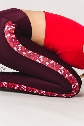 pure by luce sustainable dark red Rene Cape Town leggings with printed side stripes inspired by South Africa with the Gugu Red sports crop top
