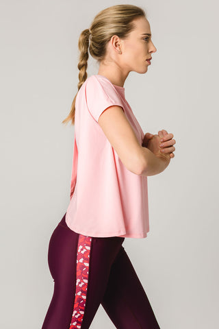 pure by luce sustainable Susan Pink sports T-shirt with open back with dark red Rene Cape Town leggings with printed side stripes